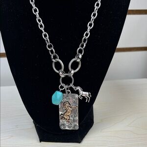 Silver Necklace with Turquoise and Horse Charms and horse earrings.